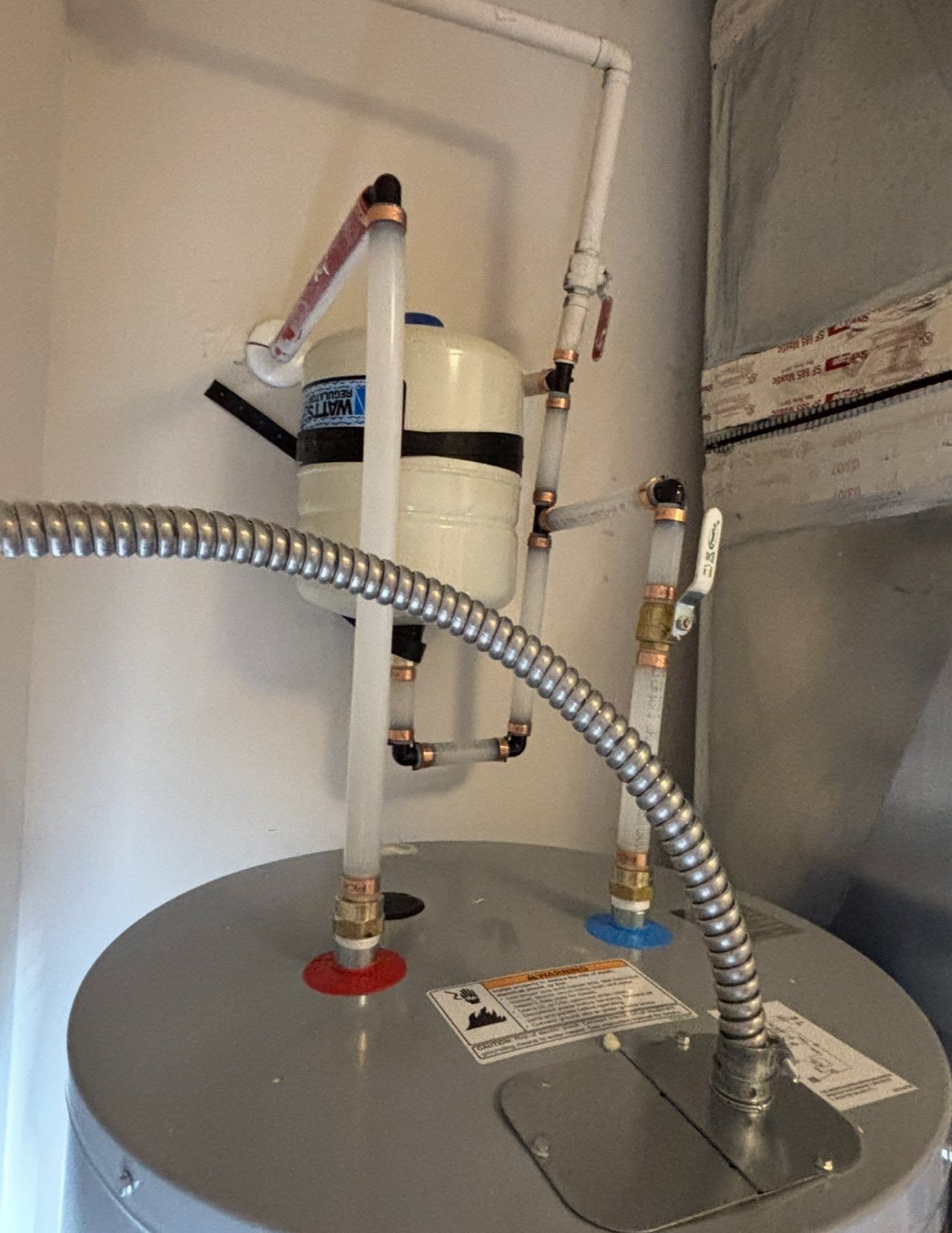 Water heater installation with expansion tank by Shires Plumbing